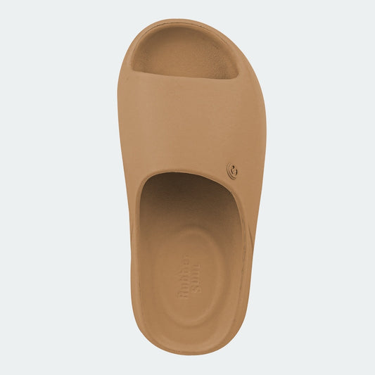 Tan slide sandal on a light gray background